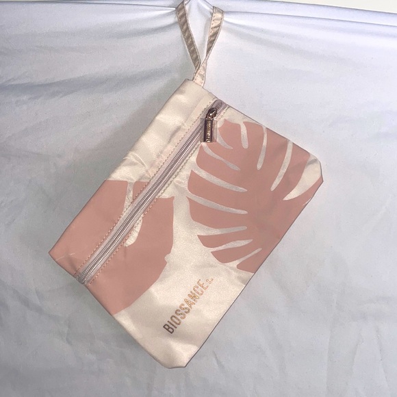 Biossance Handbags - Biossance pink zippered travel cosmetic pouch
